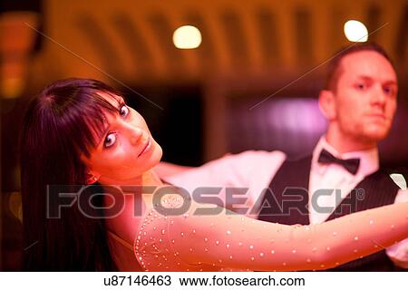 Stock Image - Young ballroom dancers, portrait. Fotosearch
