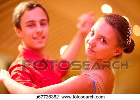 Young man and teenage girl ballroom dancers, portrait View Large Photo Image Stock Image - Young man and teenage girl ballroom dancers, portrait. Fotosearch