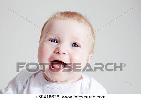 Stock Photo - Baby girl laughing. Fotosearch