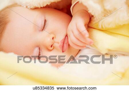 Baby in peaceful slumber View Large Photo Image Stock Photography - Baby in peaceful slumber. Fotosearch