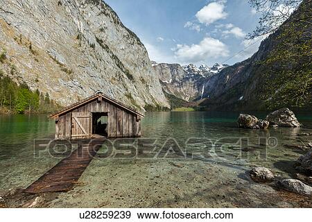 Boat dock on Obersee lake, Bavaria, Germany View Large Photo Image Stock Photo - Boat dock on Obersee lake, Bavaria, Germany. Fotosearch