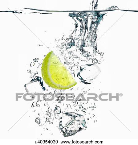Bubbly lime juice with ice cubes View Large Photo Image Stock Photo - Bubbly lime juice with ice cubes. Fotosearch