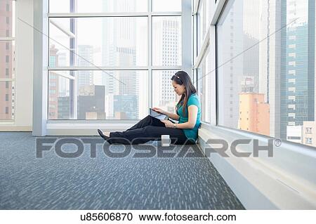 Business executive using digital tablet View Large Photo Image Stock Image - Business executive using digital tablet. Fotosearch
