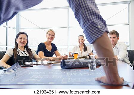 Business executives at brainstorming meeting View Large Photo Image Stock Image - Business executives at brainstorming meeting. Fotosearch