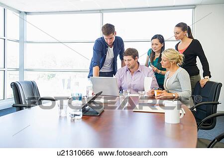 Business executives at brainstorming meeting View Large Photo Image Stock Photograph - Business executives at brainstorming meeting. Fotosearch