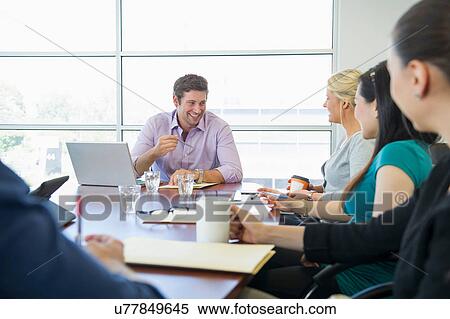 Business executives at brainstorming meeting View Large Photo Image Stock Photography - Business executives at brainstorming meeting. Fotosearch