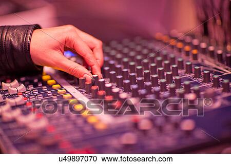Close up of hand and mixing desk in recording studio View Large Photo Image Stock Image - Close up of hand and mixing desk in recording studio. Fotosearch