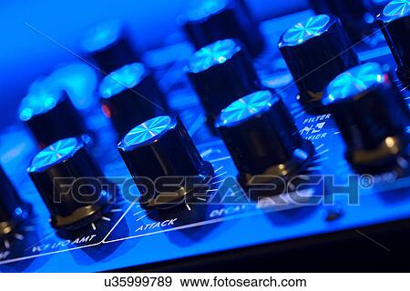 Close up of switches on mixing desk View Large Photo Image Stock Photo - Close up of switches on mixing desk. Fotosearch