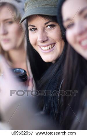 Close up of young female friends View Large Photo Image Stock Photo - Close up of young female friends. Fotosearch
