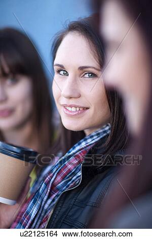 Picture - Close up portrait of young female friends. Fotosearch
