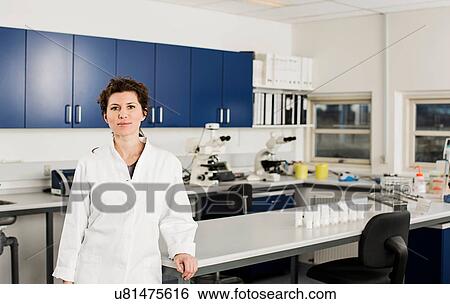 Stock Photograph - Female scientist in laboratory. Fotosearch