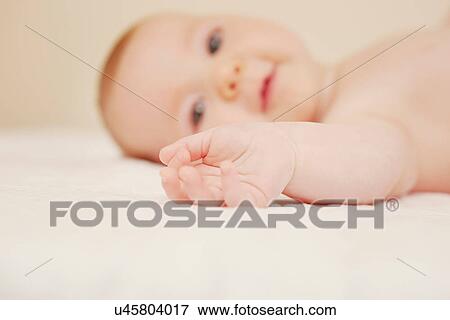 Focus on baby's hand View Large Photo Image Stock Photo - Focus on baby's hand. Fotosearch