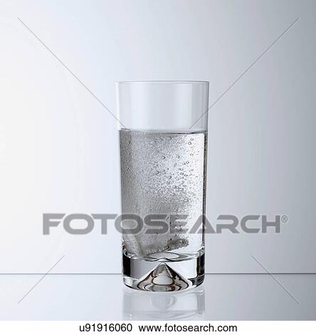 Stock Image - Glass of carbonated beverage. Fotosearch