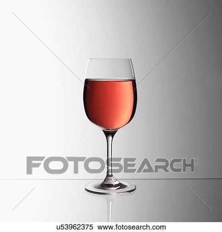 Glass of rosé wine View Large Photo Image Stock Photography - Glass of rosé wine. Fotosearch