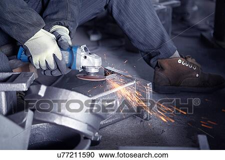 Grinding in cast iron foundry View Large Photo Image Stock Image - Grinding in cast iron foundry. Fotosearch