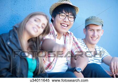 Group of teenage friends having fun View Large Photo Image Stock Photography - Group of teenage friends having fun. Fotosearch