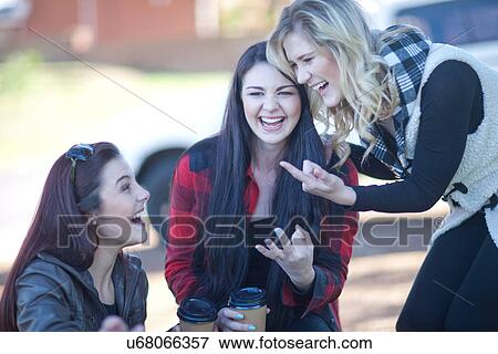 Group of young women fooling about View Large Photo Image Stock Photo - Group of young women fooling about. Fotosearch