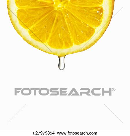 Picture - Juice dripping from orange. Fotosearch