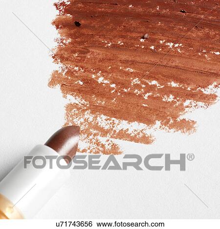 Lipstick zigzag on white background View Large Photo Image Stock Photograph - Lipstick zigzag on white background. Fotosearch