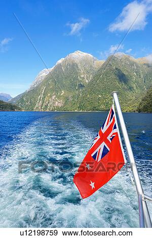 New Zealand flag, Milford Sound, Fiordland National, South Island, Southland, New Zealand View Large Photo Image Stock Photo - New Zealand flag, Milford Sound, Fiordland National, South Island, Southland, New Zealand. Fotosearch
