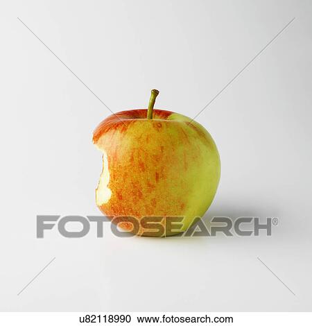 Stock Image - One apple on white background with bite mark. Fotosearch