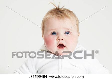 Picture - Portrait of baby girl with mouth opened. Fotosearch