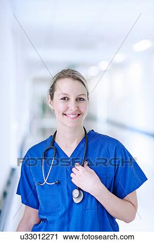 Stock Image - Portrait of doctor with stethoscope around neck. Fotosearch