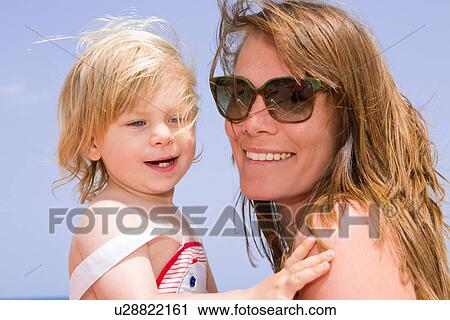 Portrait of mother and daughter View Large Photo Image Stock Image - Portrait of mother and daughter. Fotosearch