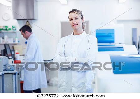 Stock Image - Portrait of researcher in laboratory. Fotosearch
