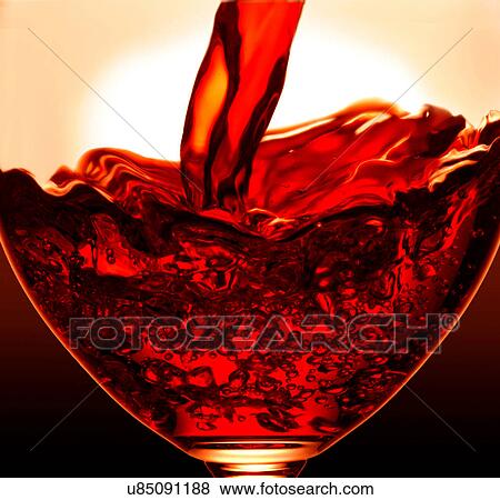 Pouring wine into glass View Large Photo Image Stock Photo - Pouring wine into glass. Fotosearch