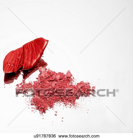 Stock Photograph - Red make up crumbled. Fotosearch