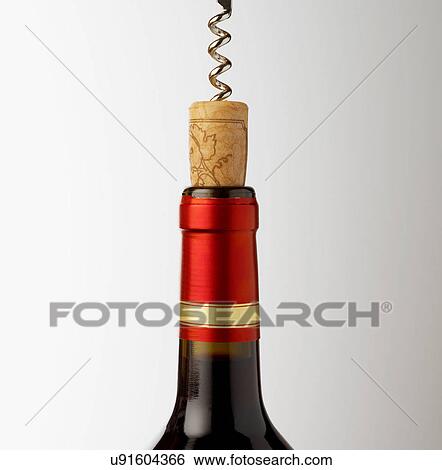 Screw in cork of wine bottle View Large Photo Image Stock Photograph - Screw in cork of wine bottle. Fotosearch