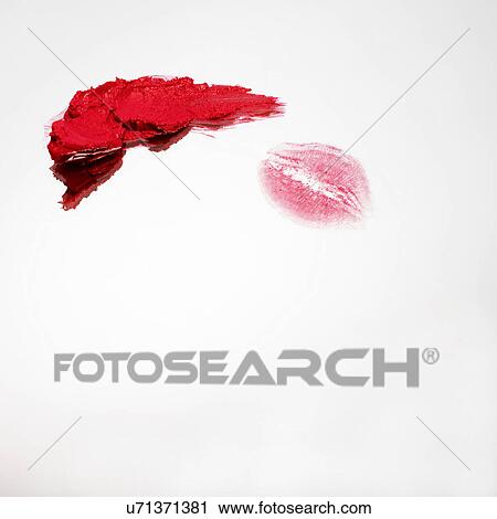 Stock Image - Smear of lipstick and lipstick kiss mark. Fotosearch