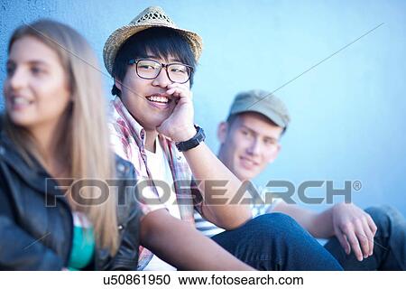 Teenage friends fooling about View Large Photo Image Stock Image - Teenage friends fooling about. Fotosearch