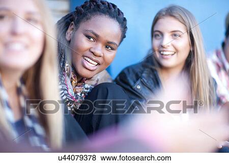 Stock Photo - Teenage friends having fun. Fotosearch