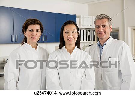 Picture - Three scientists. Fotosearch