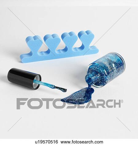 Toe separators and blue nail varnish View Large Photo Image Stock Photograph - Toe separators and blue nail varnish. Fotosearch