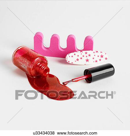Toe separators and red nail varnish View Large Photo Image Stock Photo - Toe separators and red nail varnish. Fotosearch