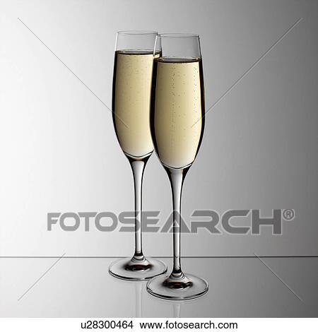 Two glasses of Champagne View Large Photo Image Picture - Two glasses of Champagne. Fotosearch