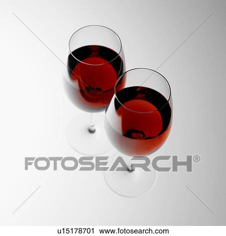 Two glasses of red wine View Large Photo Image Stock Image - Two glasses of red wine. Fotosearch