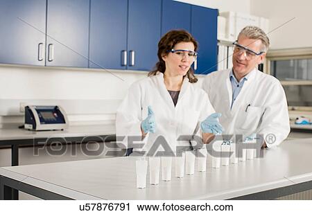 Stock Image - Two scientists in laboratory. Fotosearch