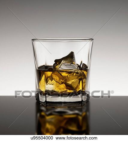 Whisky with ice View Large Photo Image Stock Image - Whisky with ice. Fotosearch