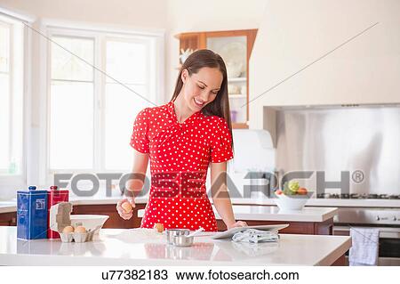Woman baking View Large Photo Image Stock Image - Woman baking. Fotosearch