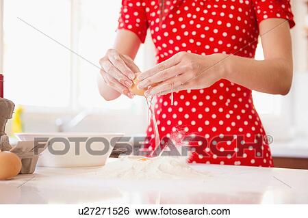 Woman baking View Large Photo Image Stock Photograph - Woman baking. Fotosearch