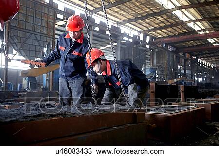 Working in cast iron foundry View Large Photo Image Stock Image - Working in cast iron foundry. Fotosearch