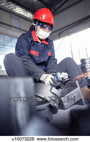 Stock Photo - Working in cast iron foundry. Fotosearch