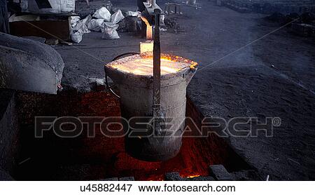 Working in cast iron foundry View Large Photo Image Stock Photo - Working in cast iron foundry. Fotosearch