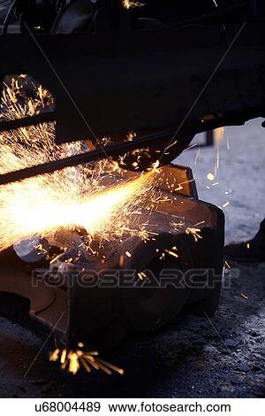 Stock Photo - Working in cast iron foundry. Fotosearch