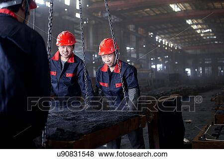 Stock Photo - Working in cast iron foundry. Fotosearch