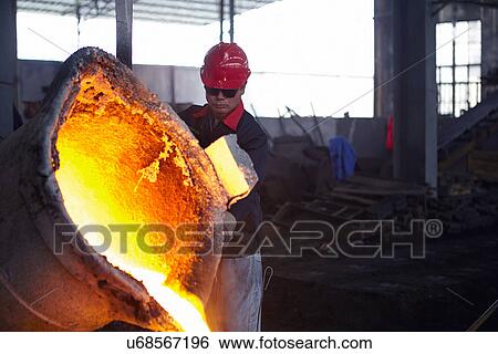 Working in cast iron foundry View Large Photo Image Stock Photograph - Working in cast iron foundry. Fotosearch